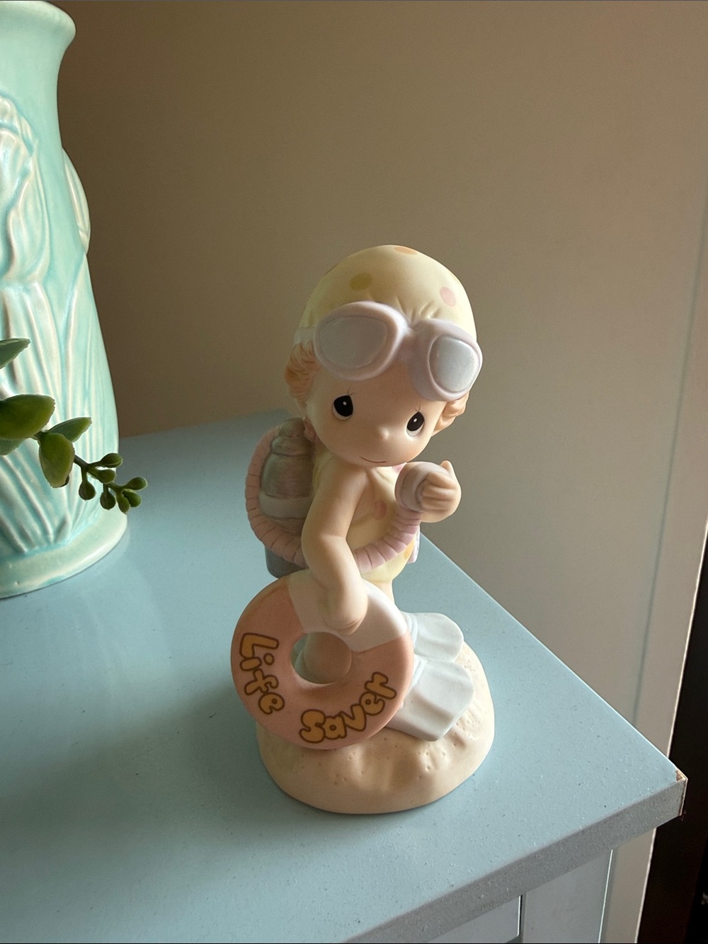 Precious Moments Pink and Cream 'Life Saver' Child Figurine